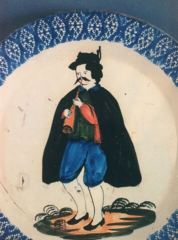 Pifferaio con mantello